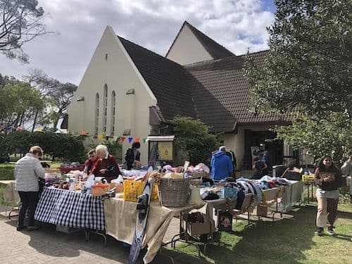 Parish fête stalls on the chapel lawn